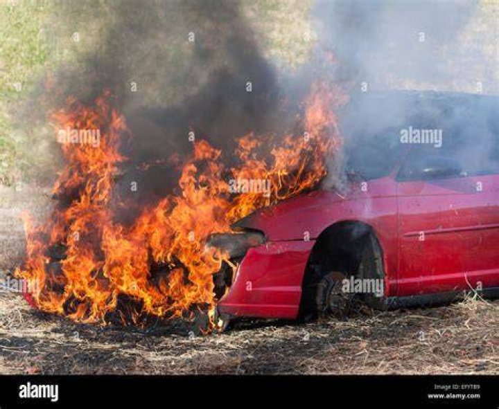 A car is engulfed in mud and water after a mud slide due to severe storms that hit Southern California causing flooding and mud slides