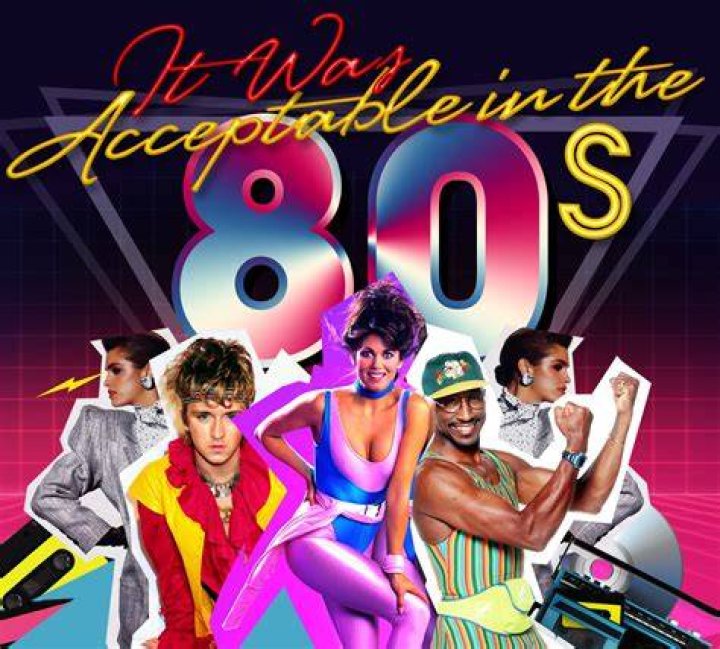 Acceptable in the 80s: Busy wore pink and white leggings, a pink gilet over a sports bra and arm warmers