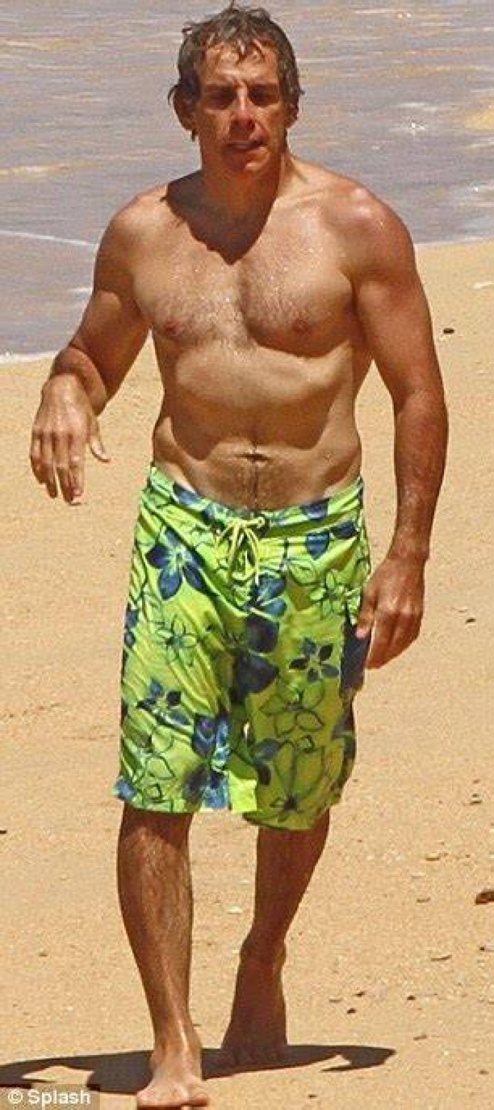 Beach break: Ben Stiller and wife Christine Taylor put their bodies on show in Hawaii this week