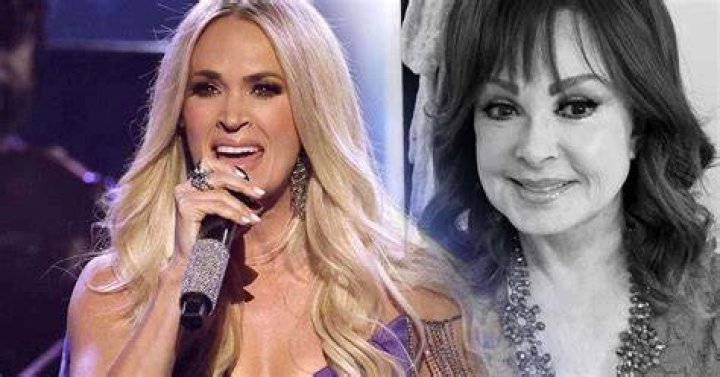 Carrie Underwood paid an emotional tribute to county singing legend Toby Keith on Tuesday - following his tragic death from stomach cancer aged 62 (pictured together 2022)