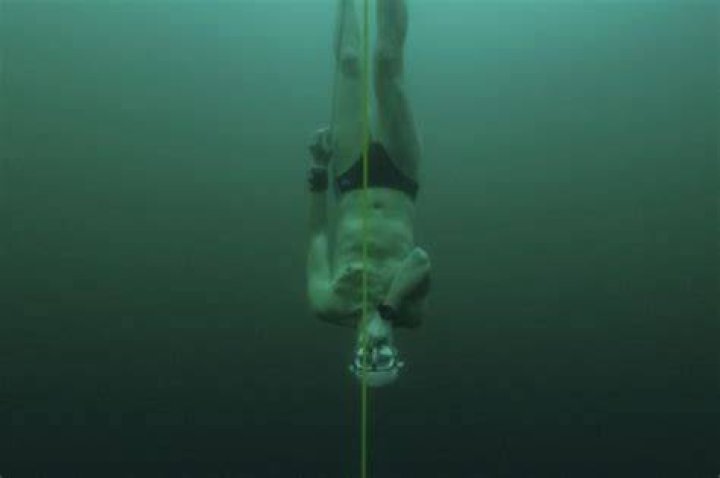 Czech free-diver David Vencl dives to 170 feet (52 metres) under the ice of Lake Sils