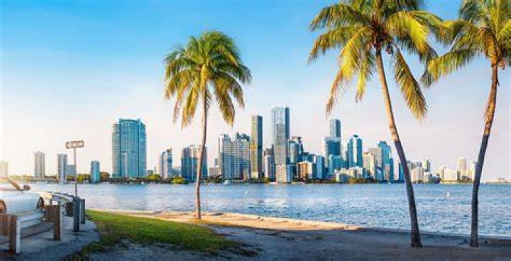 Miami nice: After spending a day soaking up the rays, Chriqui wrapped herself in a large beach towel as she made her way back to her hotel