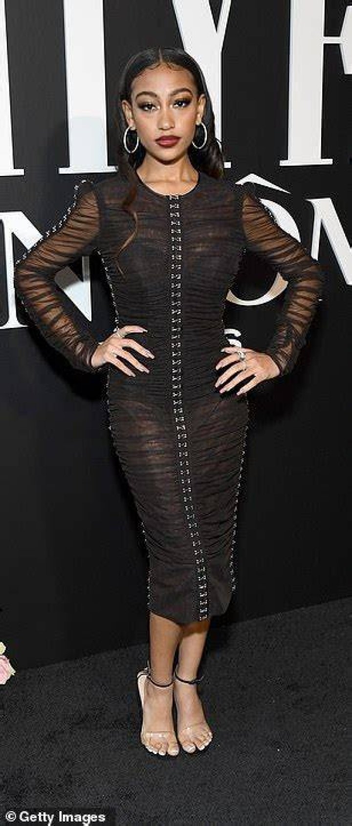 Monochrome: Lexi Underwood stunned in a black gown with silver buckles