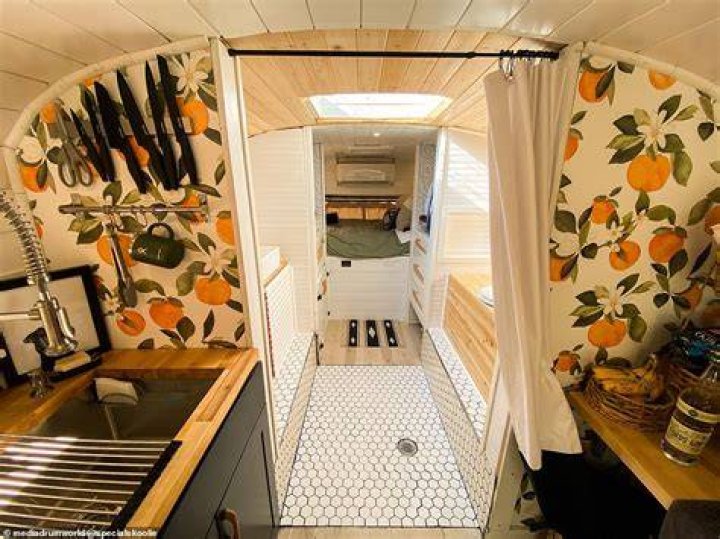 Not only did she instal a lift so he could get in and out of the bus on his own, but she also added a kitchen area, a big bathroom, and two beds for them to sleep in