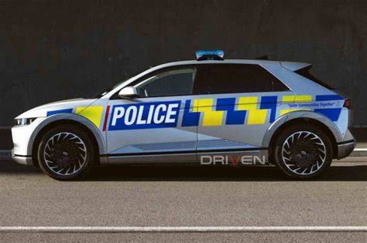 Police surrounded this silver Hyundai operated by Tyran Lamb after he fled a traffic stop, led cops on a chase and crashed into another vehicle