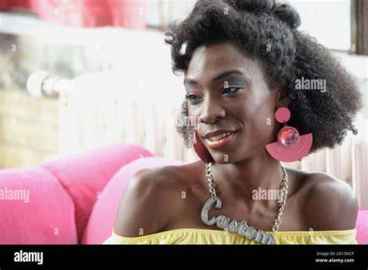 Pretty in pink: Angelica Ross stunned in a fuchsia one-shoulder gown which she paired with silver pointed heels