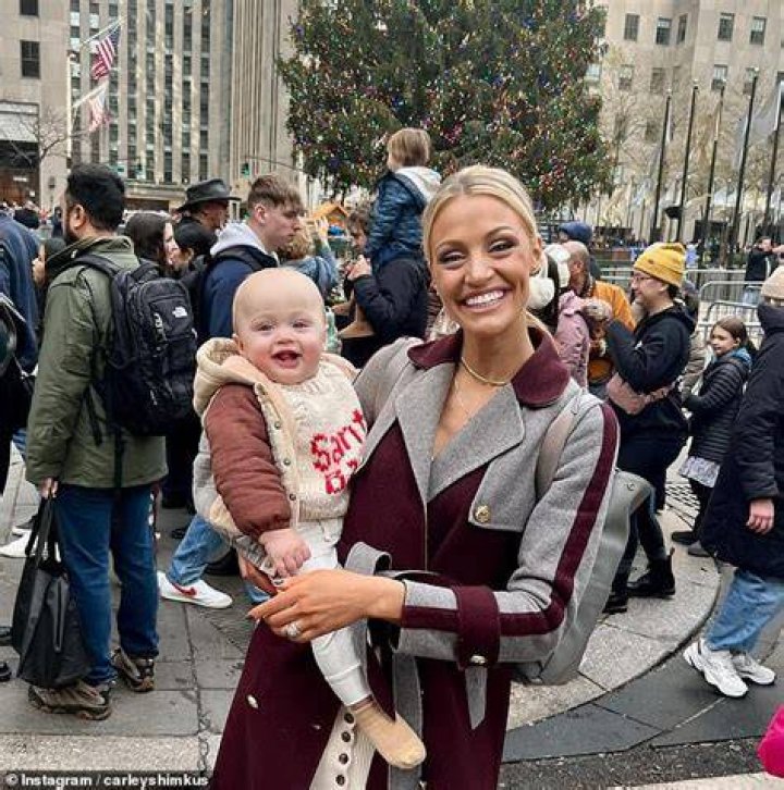 Shimkus has been giving baby Brock his first Christmas experience (pictured at NYC's Rockefeller Center). 'Christmas coming up is really fun. We just did pictures with Santa and he is such a friendly baby and he will go with anybody and smile at anybody - but he had a full meltdown on Santa's lap. I have some pretty cute pictures,' she laughed.