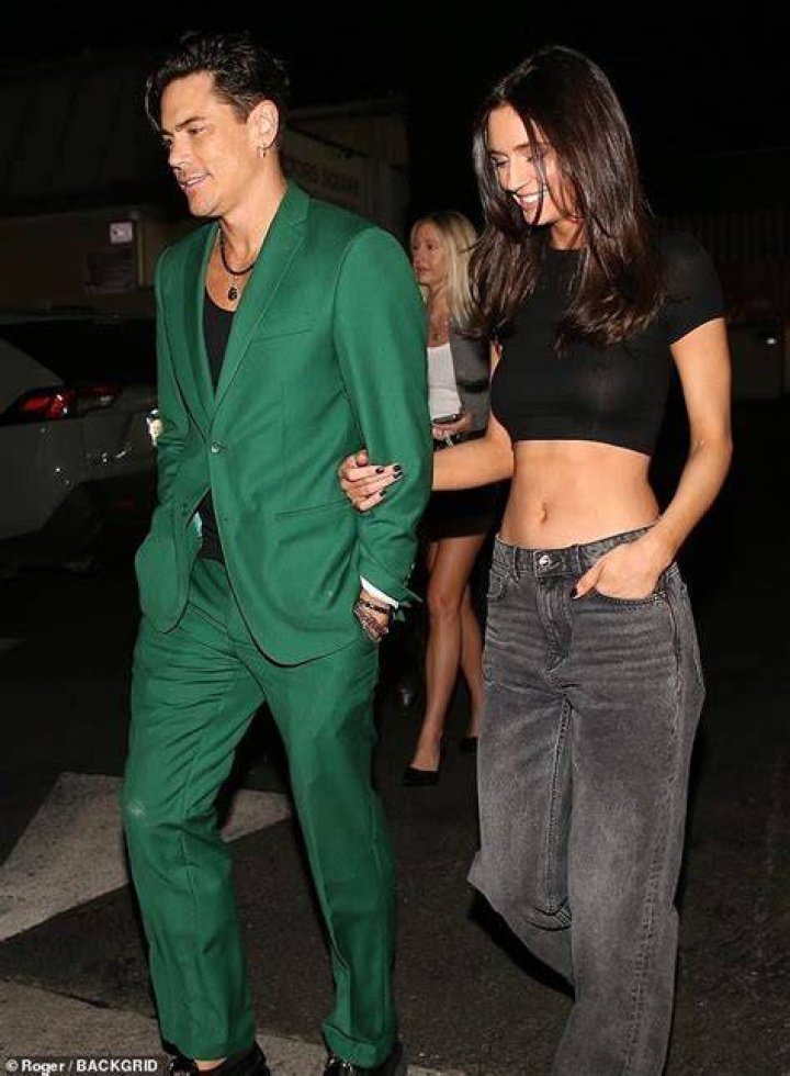 The reality television personality opted for a low-cut one-piece that accentuated her cleavage and derriere