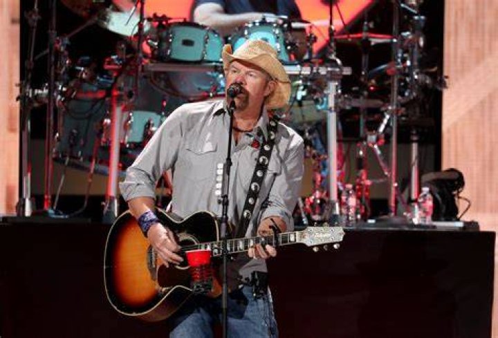 Toby Keith's mother Carolyn joined him on stage in Las Vegas during one of his final concerts, less than two months before his death. He is pictured with his mother during his childhood