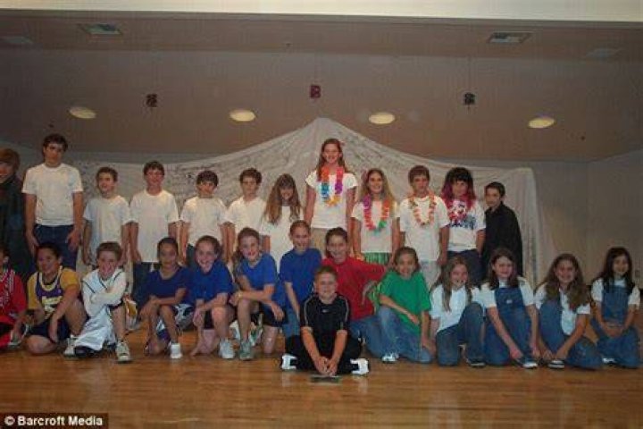 Towering over her peers: Chase (back row, center) is pictured during her fifth grade school talent show
